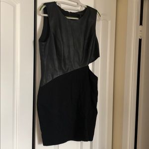 BCBG cutout black dress. Leatherlike top. Like new